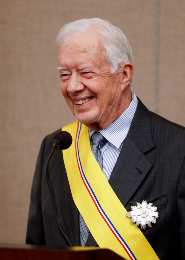 Former President Jimmy Carter addresses the audience after being awarded the Order of Manuel Amador Guerrero by Panamanian President Juan Carlos Varela