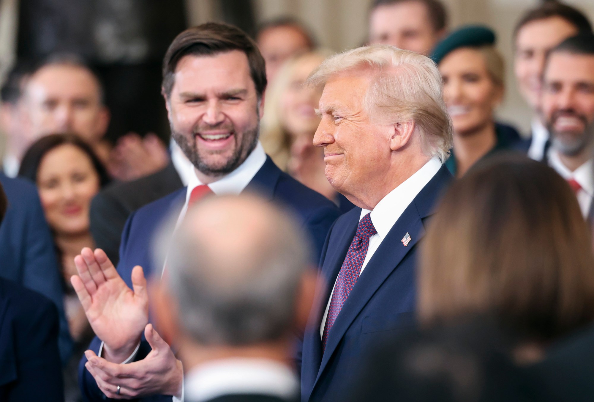 Vice President-elect JD Vance, left, looks on as President-elect Donald Trump arrives at the 60th Presidential Inauguration in the Rotunda of the U.S. Capitol in Washington, Monday, Jan. 20, 2025. (Kevin Lamarque/Pool Photo via AP)