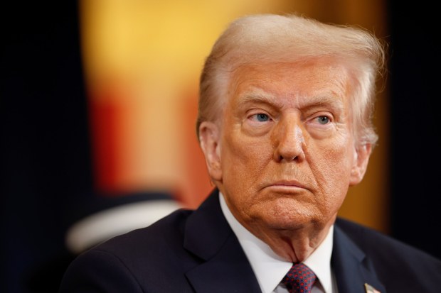 President-elect Donald Trump looks on as he arrives for the 60th Presidential Inauguration in the Rotunda of the U.S. Capitol in Washington, Monday, Jan. 20, 2025. (Chip Somodevilla/Pool Photo via AP)