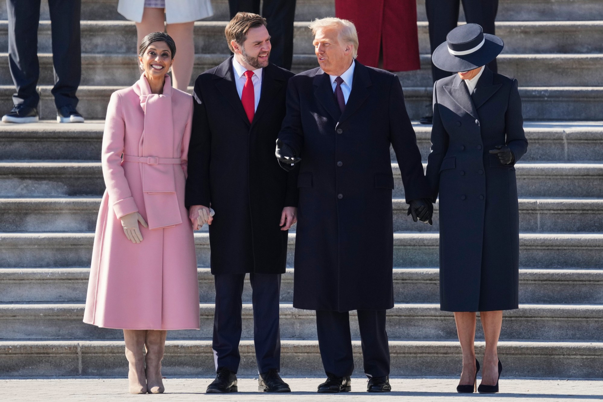 Second lady Usha Vance, left, Vice President JD Vance, second from left, President Donald Trump, second from right, and first lady Melania Trump look on as the Bidens depart to Joint Base Andrews on a Marine helicopter after the 60th Presidential Inauguration, Monday, Jan. 20, 2025, at the U.S. Capitol in Washington. (Chris Kleponis/Pool Photo via AP)