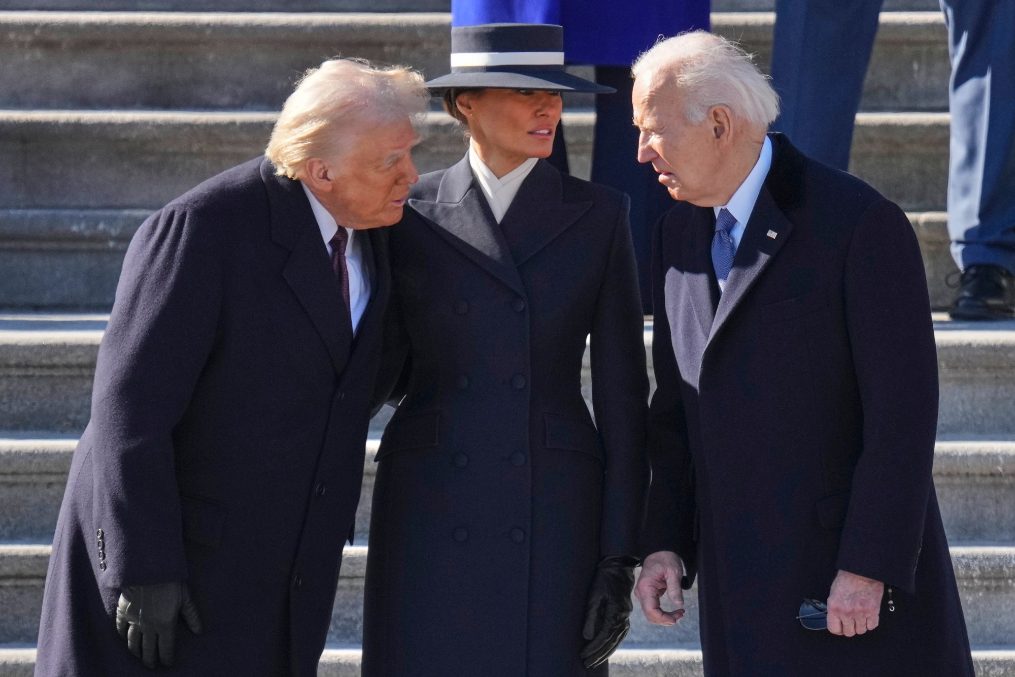 President Donald Trump, left, and first lady Melania Trump, center, speak with former President Joe Biden before the Bidens board a Marine helicopter to depart to Joint Base Andrews after the 60th Presidential Inauguration, Monday, Jan. 20, 2025, at the U.S. Capitol in Washington. (Chris Kleponis/Pool Photo via AP)