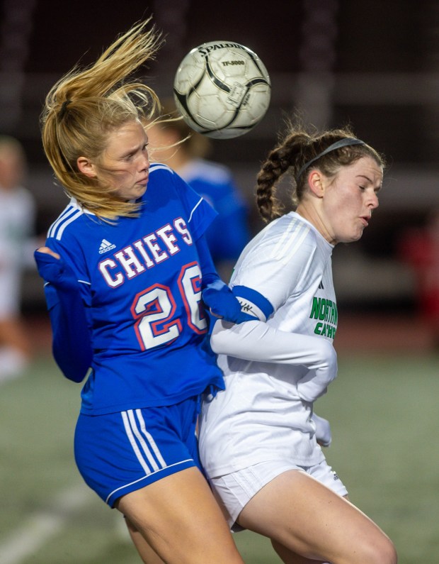 Northwest Catholic's Maeve Staunton (15) and Nonnewaug's Karli Brandt (2) fight for the ball during the first half of the Girls Soccer Class M Semifinals at Veterans Stadium at Willow Brook Park in New Britain on Tuesday, Nov. 12, 2024. (Aaron Flaum/ Hartford Courant)