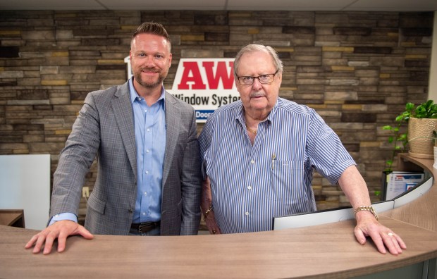 Mark LaVoie, president at Advanced Window Systems LLC, left. with his father Joe LaVoie, who founded the company in 1978. (Aaron Flaum/Hartford Courant)