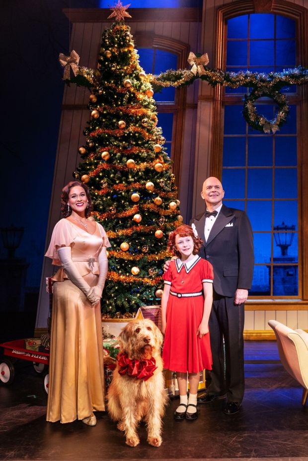 Julia Nicole Hunter as Grace Farrell, Christopher Swan as Oliver Warbucks and Hazel Vogel as Annie in "Annie." The tour is directed by Connecticut resident Jenn Thompson. (Matthew Murphy/MurphyMade)