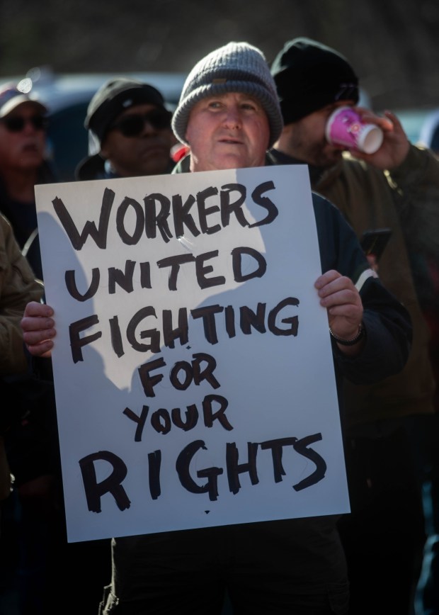 Machinists hold signs during an union rally in front of Pratt and Whitney in Middletown after machinists were locked out on Friday, Jan. 3, 2025. (Aaron Flaum/ Hartford Courant)