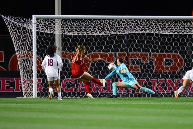 UConn women's soccer goalkeeper Kaitlyn Mahoney makes a save in a 2-1 win over Rutgers in a first round NCAA Tournament game Saturday. Mahoney made six saves in the win. UConn will play Stanford in a second round game Friday in Fayetteville, Ark. (Photo courtesy of UConn Athletics)