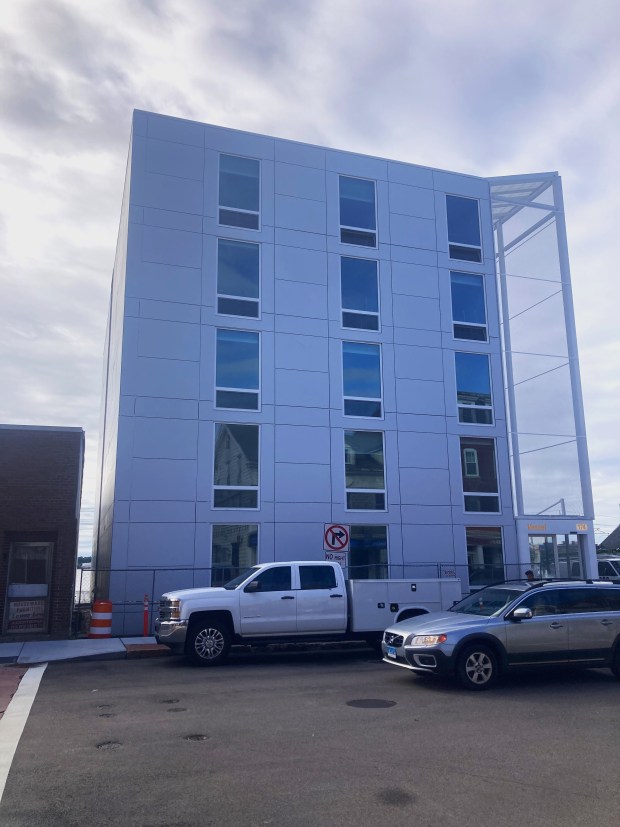 In early fall, Vessel Technologies' apartment building in New London was nearly complete. The company is moving tenants in this month. (Don Stacom/The Hartford Courant)